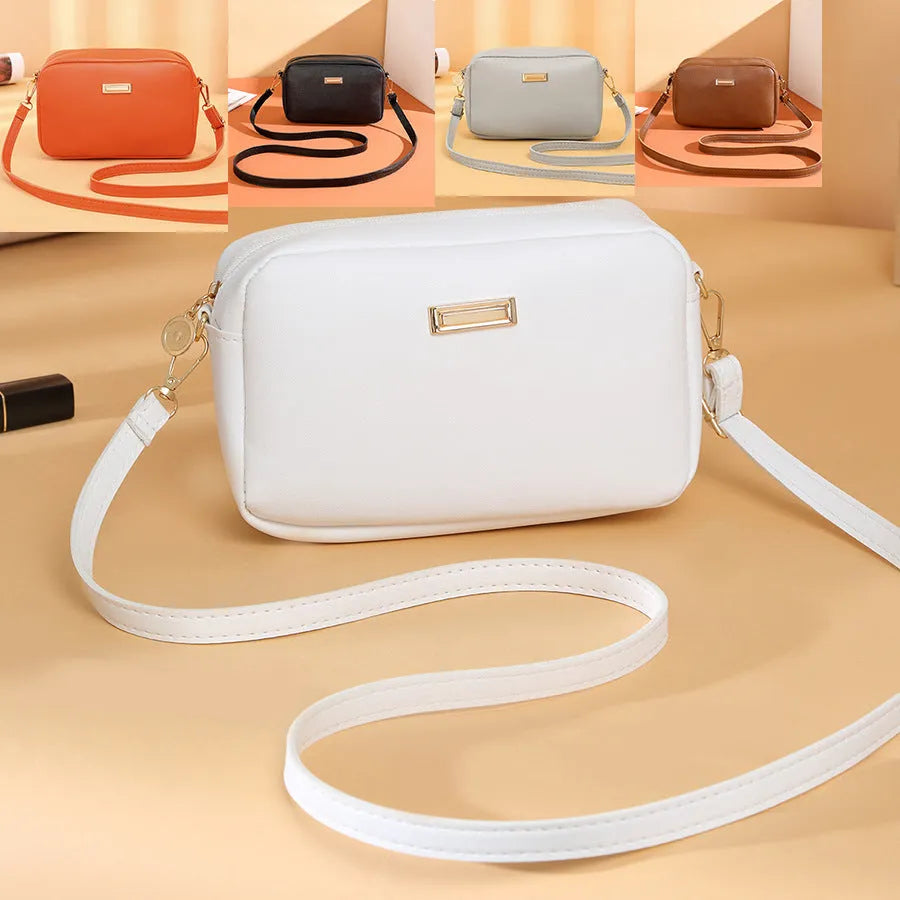 Women's solid colour PU shoulder bag with three-dimensional pocket in urban simplicity style