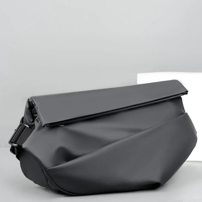 Men's grey medium crossbody bag with shoulder strap showing internal phone and document pockets
