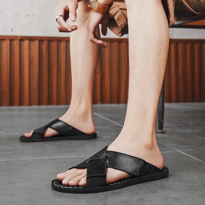 Men's black pigskin leather slip-on sandals with open design and rubber soles