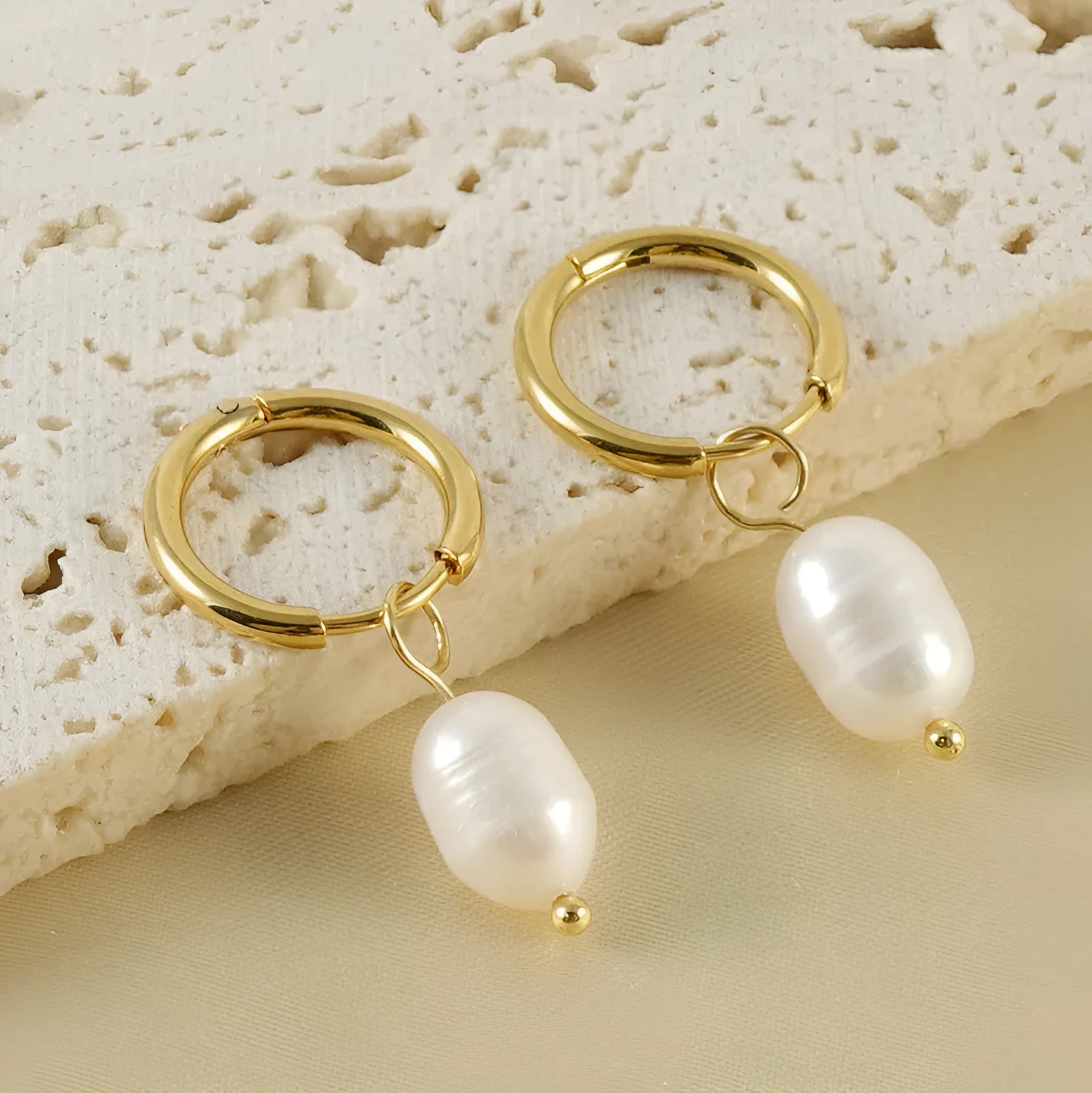 Gold geometric pearl earrings in stainless steel with titanium steel components