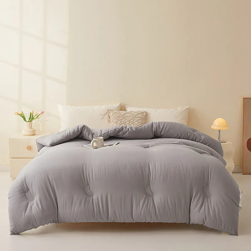 Soybean fibre quilt with pure cotton cover in grey colour showing twill weave texture detail