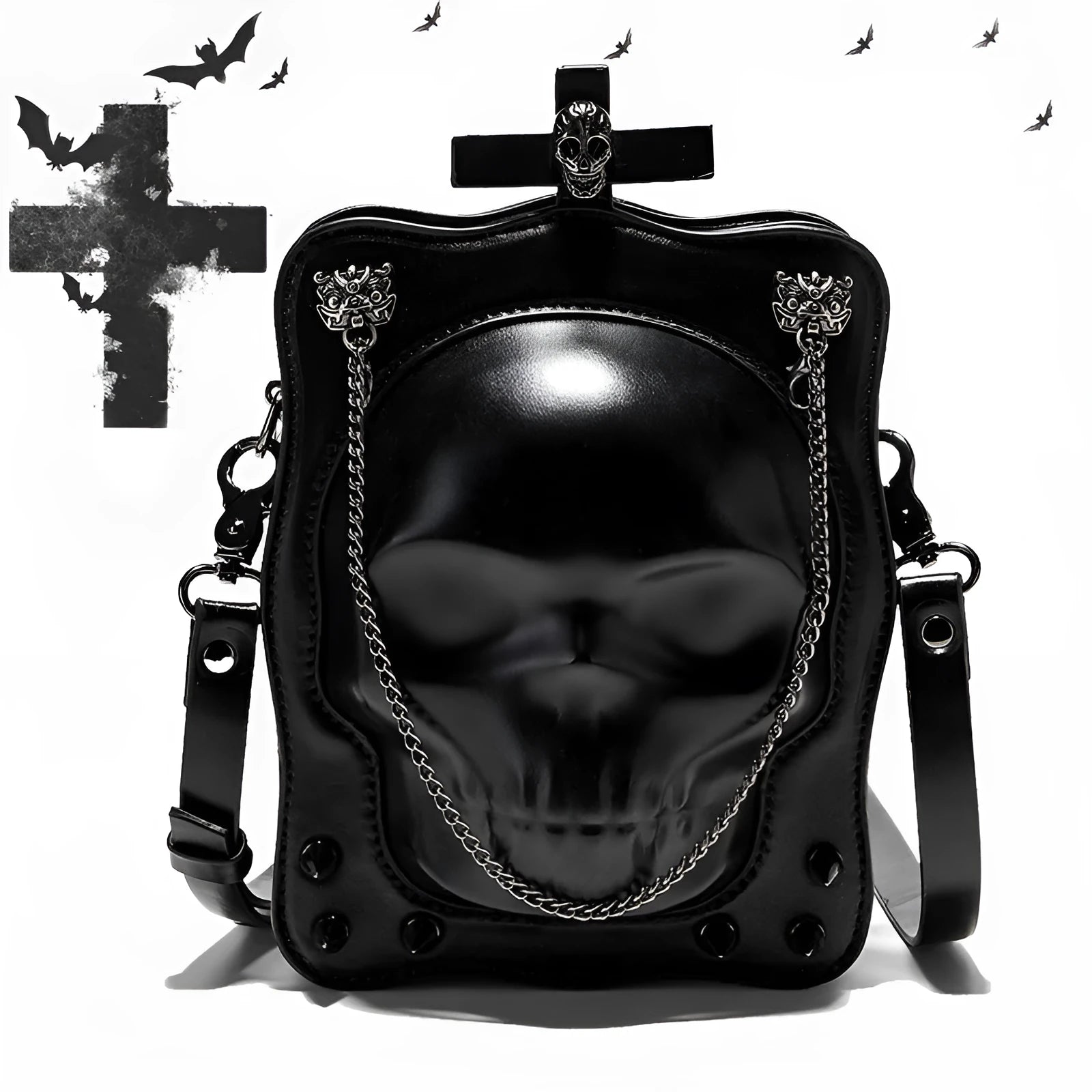 Black gothic mini square messenger bag with skull embossing, stitching, rivets, and chain details on textured PU polyester