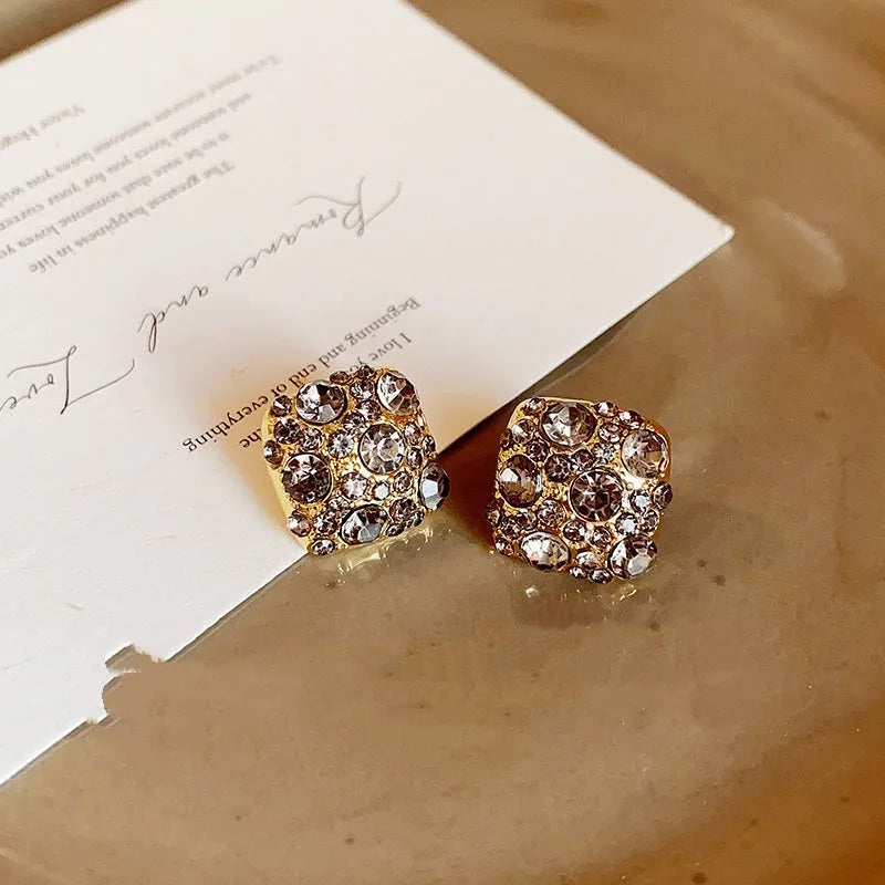 Gold tone alloy square earrings with black micro inlaid zircon and chamfered square grain for women