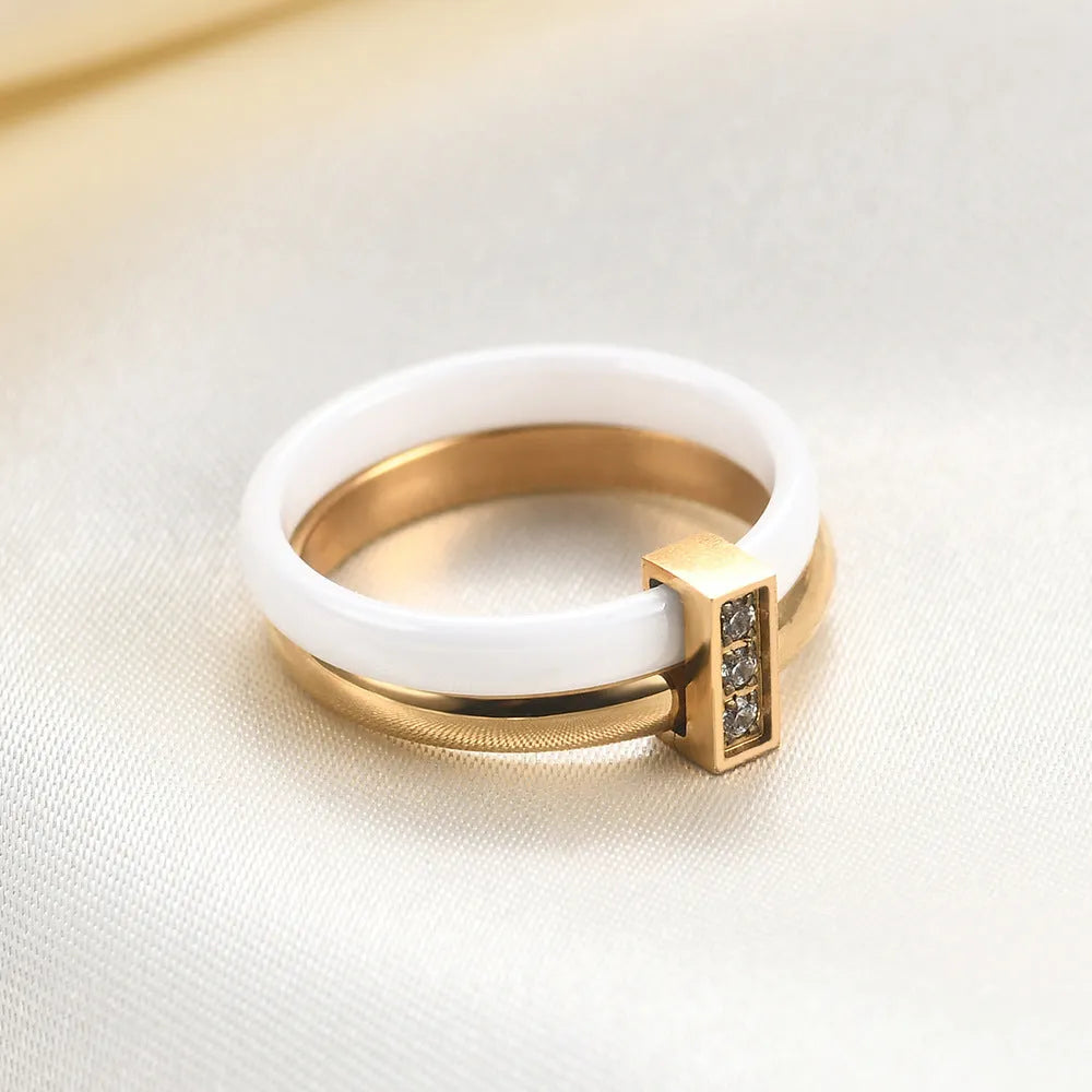 Ceramic geometric ring with glossy stitching and zirconium detail in steel black finish