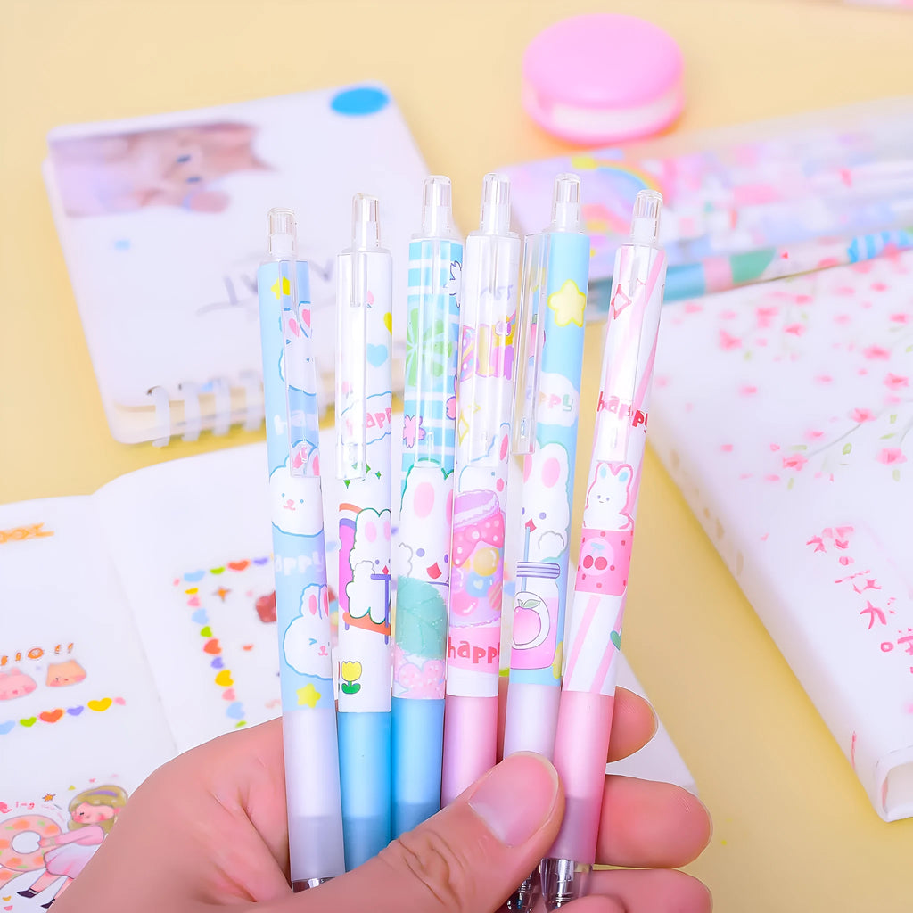 Six plastic ballpoint pens with cartoon bunny design showing 0.5mm tips and neutral black ink