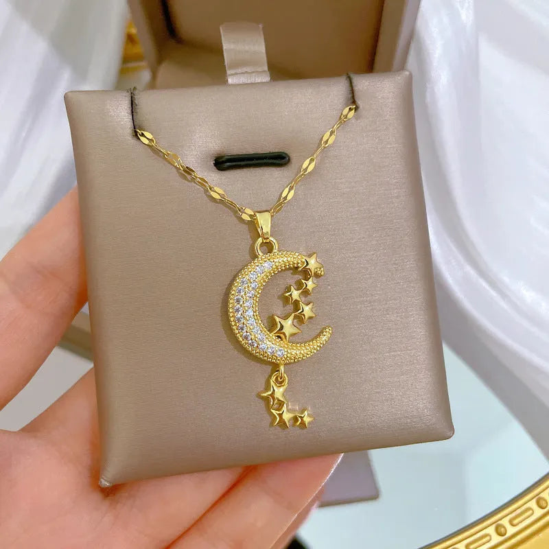 Stainless steel moon pendant necklace with geometric diamond pattern and copper accent