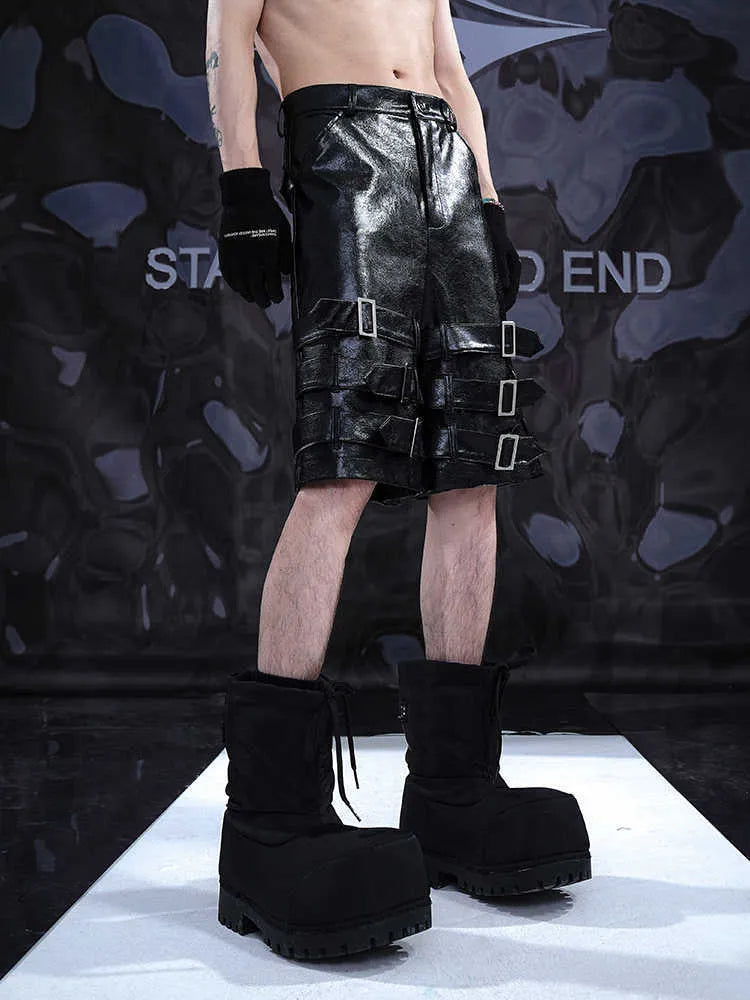Men's black PU leather cropped shorts with leather ring detailing and medium-low waist design