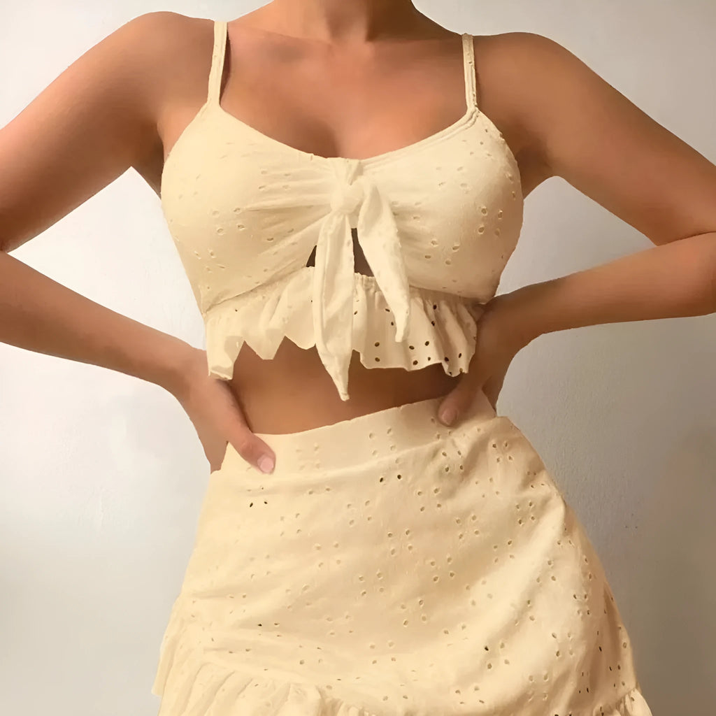 Women's three-piece bikini swimsuit with split hip skirt in solid colour