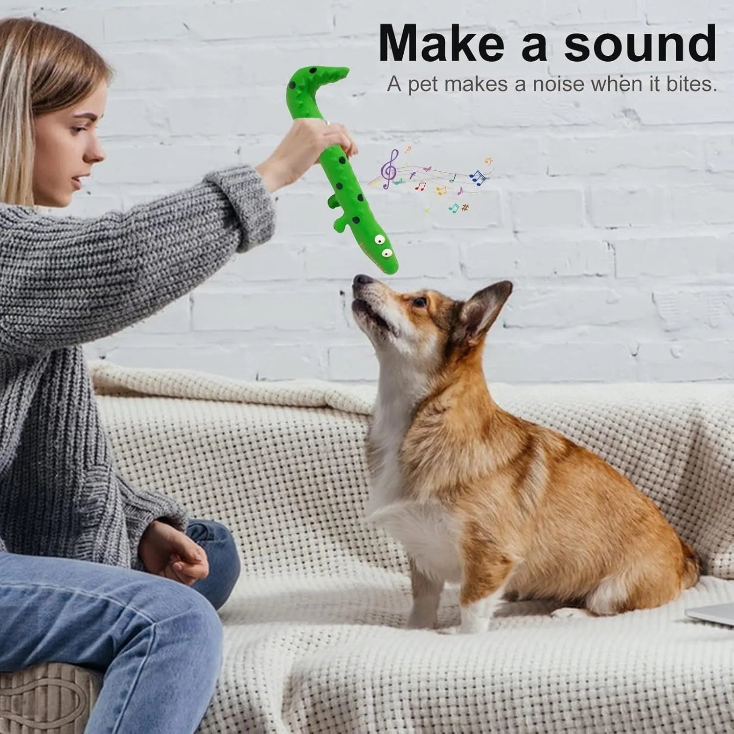 Green lizard-shaped dog chew toy with squeaker, measuring 24 cm long for aggressive chewers