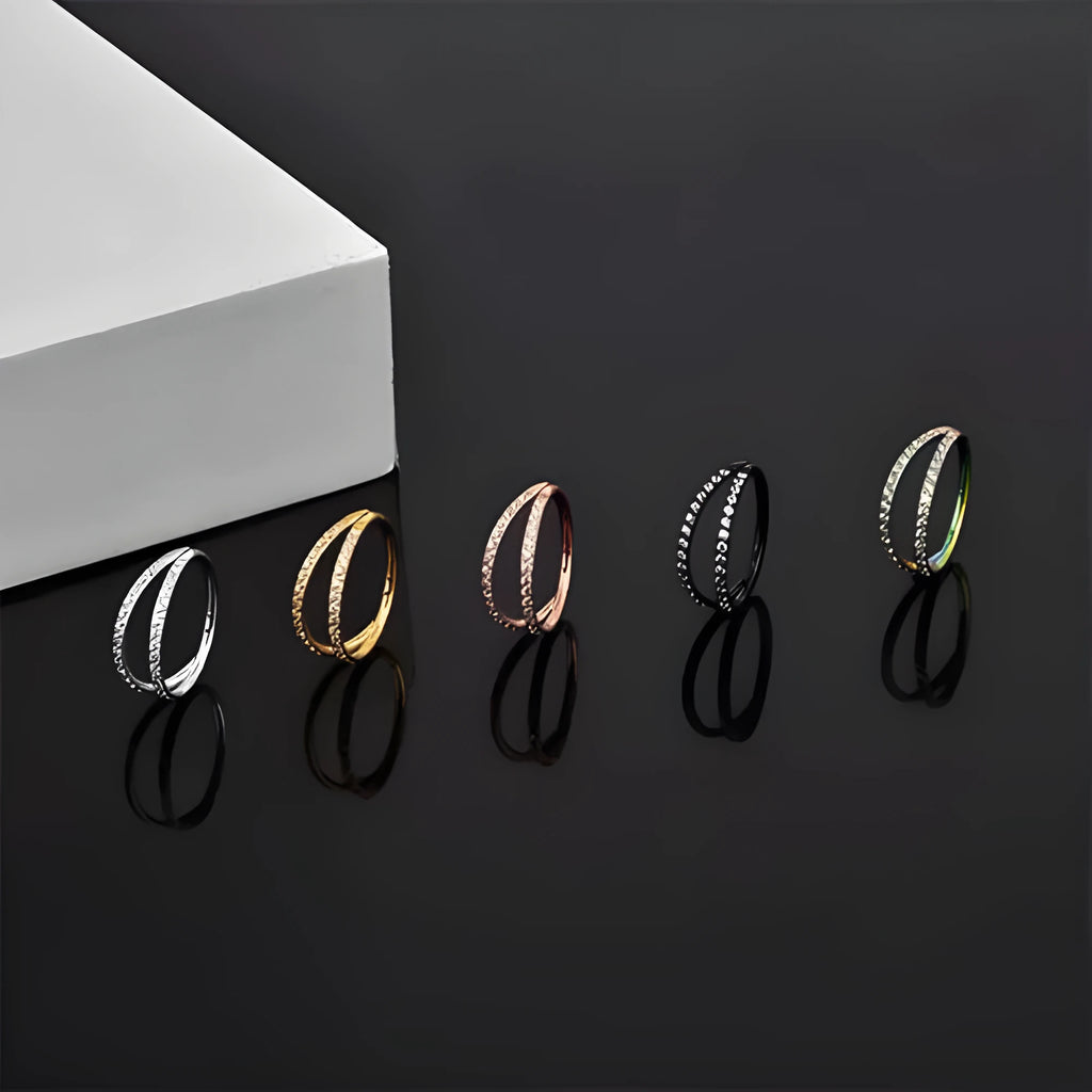 Titanium alloy nose ring with G23 monoclinic diamond treatment in steel or gold colour options