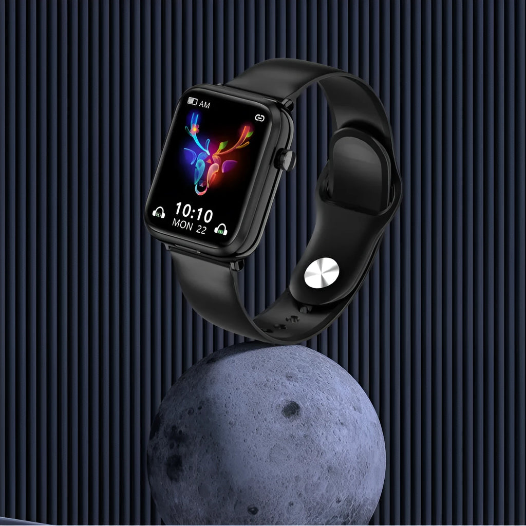 Black zinc alloy smartwatch with touch screen next to its wireless Bluetooth earbuds and charging case.