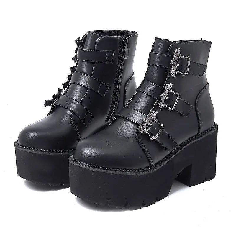 Black women's Harajuku punk ankle boots with a bat-shaped buckle and side zipper.