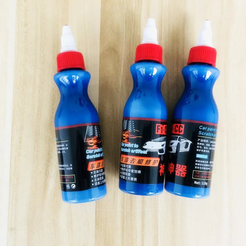 Automobile scratch repair kit with blue wiping tool and repair agent bottle for car paint restoration