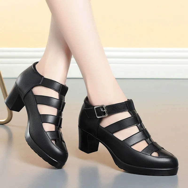 Women's beige closed toe sandals with a chunky heel, woven ankle strap, and back zipper.