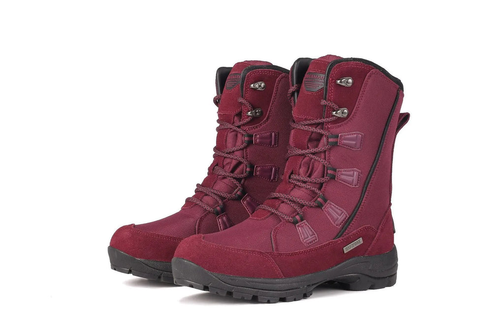 Women's black mid-calf leather snow boot with a textured non-slip rubber sole.