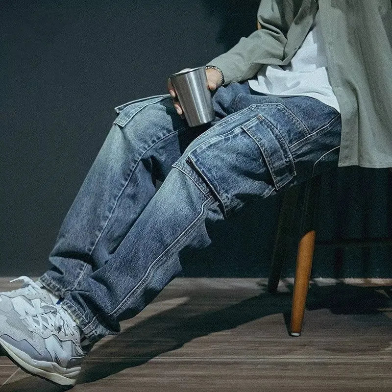 Blue men's loose fit straight leg stretch denim jeans with a zip fly closure.
