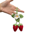 Handmade strawberry-shaped car decoration pendant woven from cotton and hemp materials using hook knitting techniques