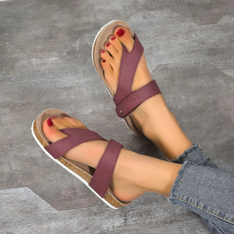 Flat thick-soled flip-flops with a toe ring strap in blue, showing artificial PU upper and foam sole.