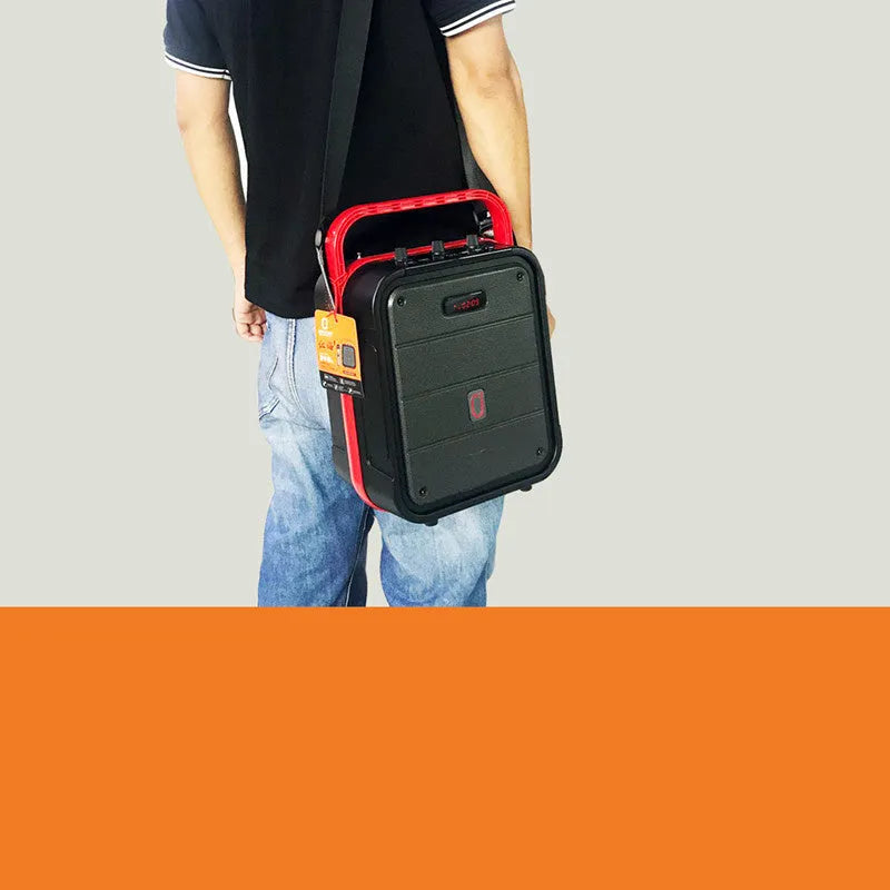 MS62AI portable Bluetooth speaker with wireless microphone, remote control, and strap