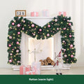 Pink Christmas rattan garland with small fruit detailing, 2.7 metres long with optional lighting