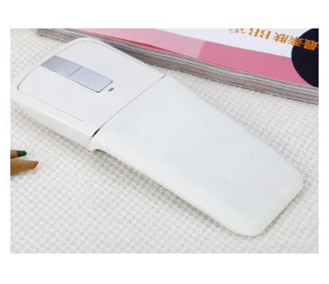 Black folding Bluetooth wireless mouse showing compact 131.2mm design with touch surface