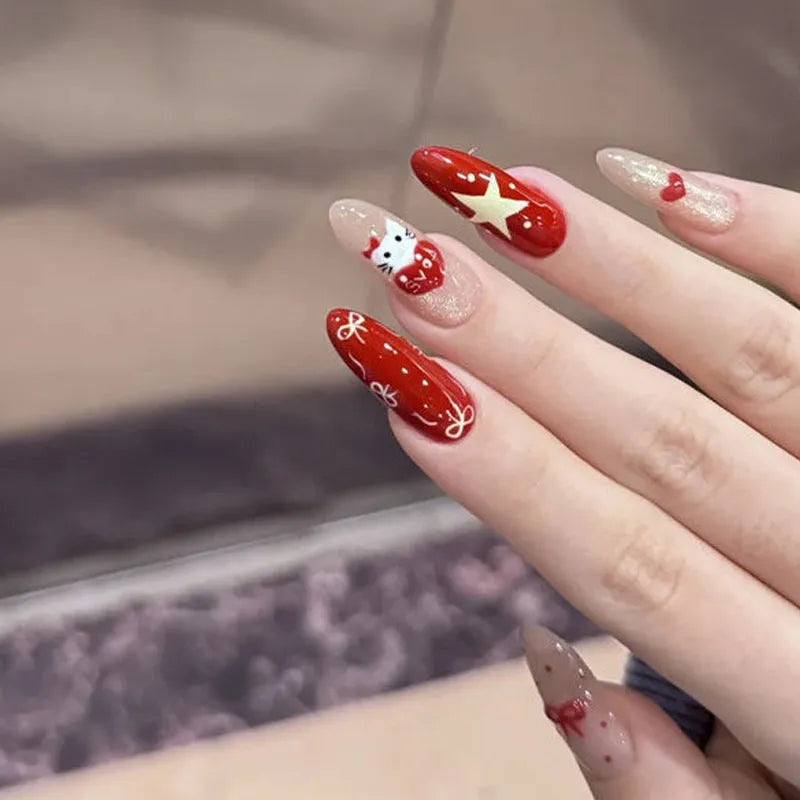 Pack of false nails with assorted nail art designs and adhesive tabs for temporary wear.