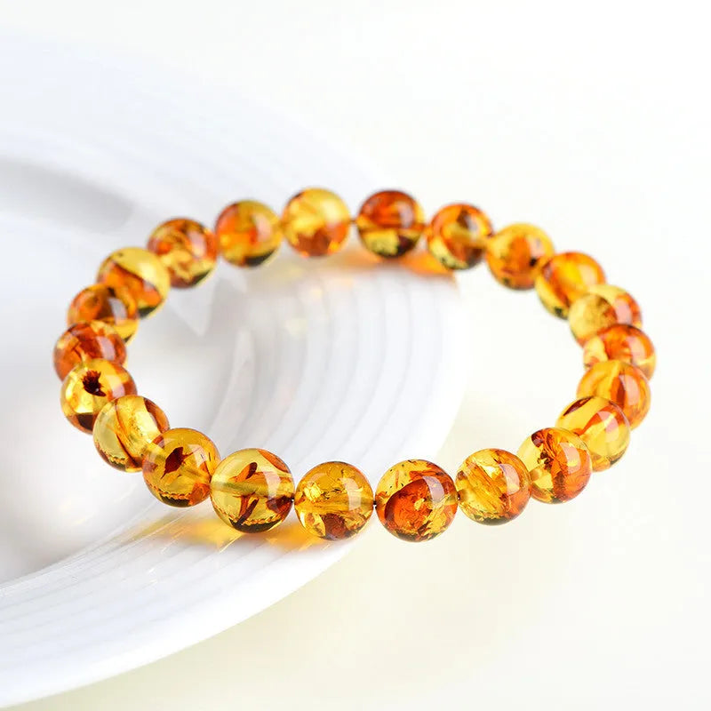 Natural yellow piebald amber bracelet with geometric polished beads for water purification