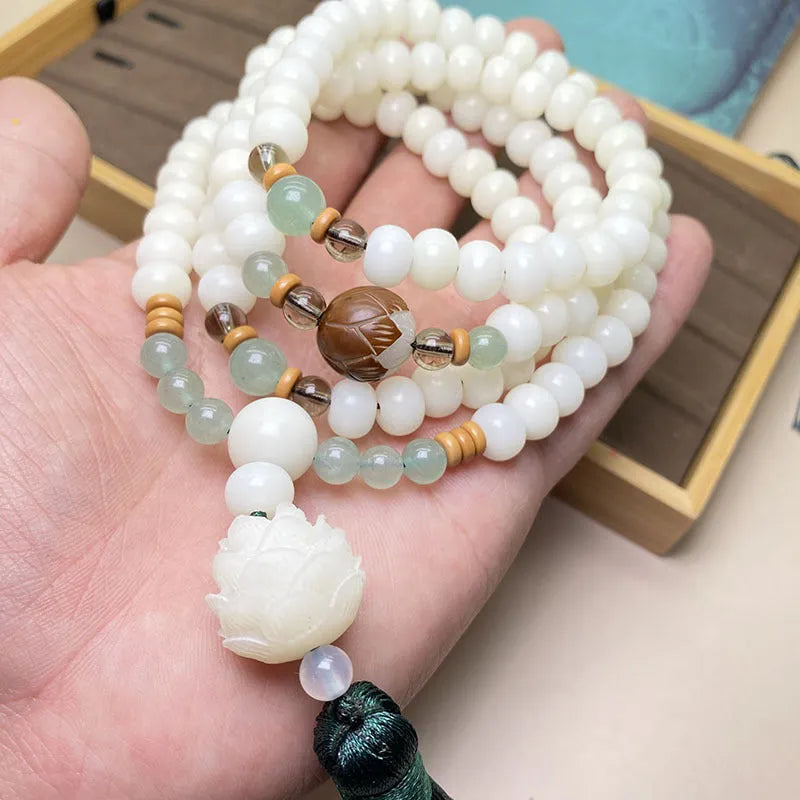 White Jade Bodhi bead bracelet with 108 beads in three pattern styles.