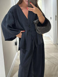 Women's solid colour two-piece set with long sleeve cardigan top and matching trousers, zip and button front, sizes S to XXL