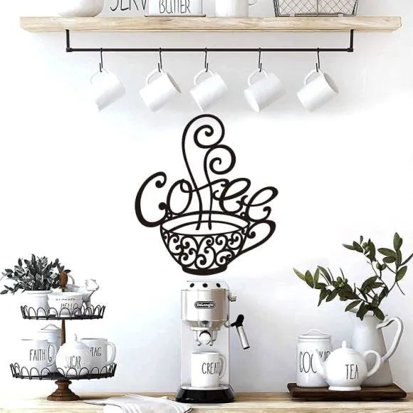 Black wrought iron wall ornament with English letter silhouettes measuring 26x28cm