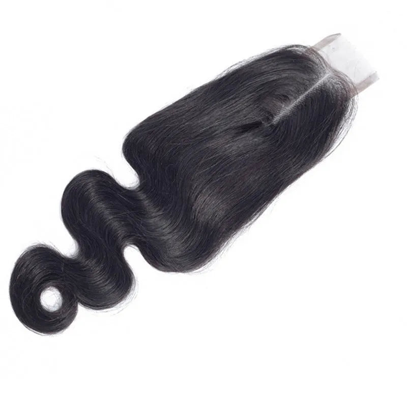 A woman wearing a straight, natural colour human hair wig with long, sleek strands.