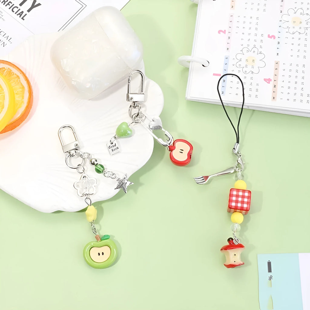 Fruit pattern mobile phone charm keychain with apple and strawberry designs on plastic resin