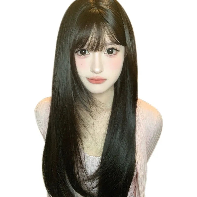 Dark brown synthetic long straight wig with bangs on wig head
