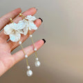 Women's acrylic pearl drop chain tassel earrings with multiple clip options