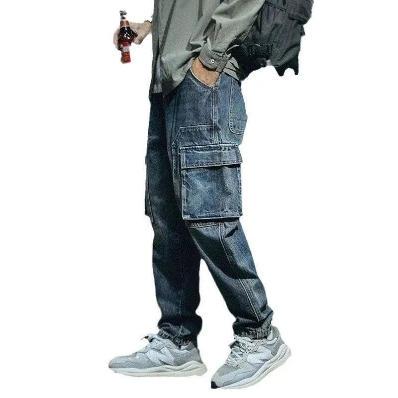 Blue men's loose fit straight leg stretch denim jeans with a zip fly closure.