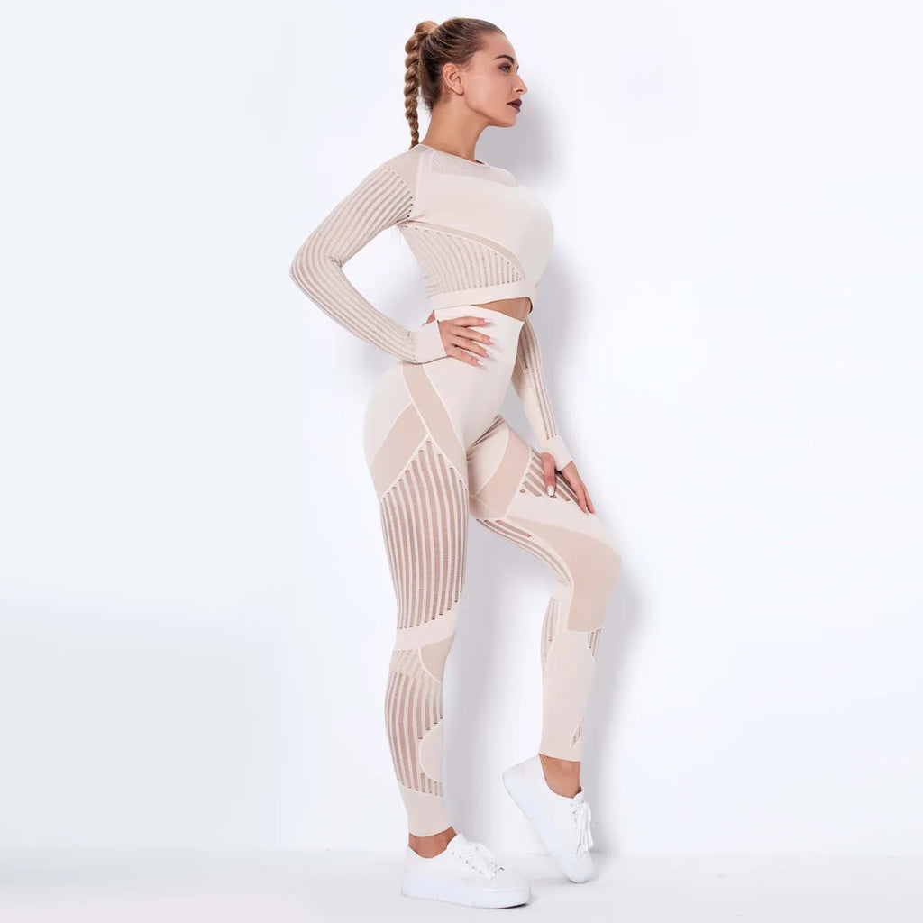 Seamless knitted long-sleeved yoga suit for women in a solid colour, showing full-length design.