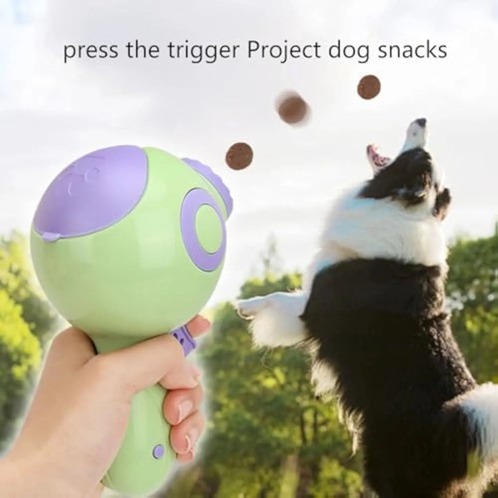 Green, orange, and pink coloured dog treat launcher toy with food dispenser