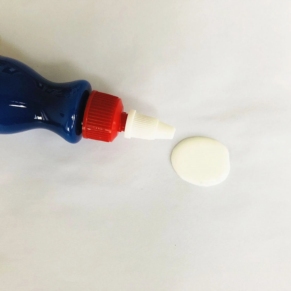 Automobile scratch repair kit with blue wiping tool and repair agent bottle for car paint restoration