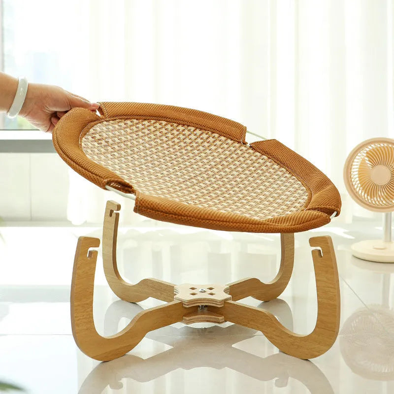 Brown woven rattan pet bed measuring 46x46cm with 17.5cm raised platform for cats and dogs