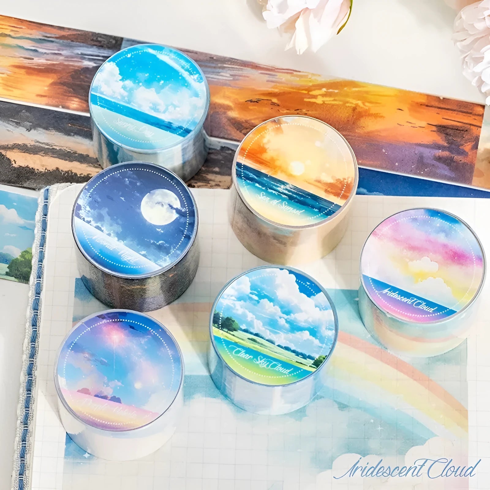 Roll of Japanese washi tape with sky theme designs including clouds, sun, moon, and nebula on a 30mm wide format.