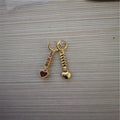 Women's heart-shaped fashion earrings with gold or silver electroplated alloy construction