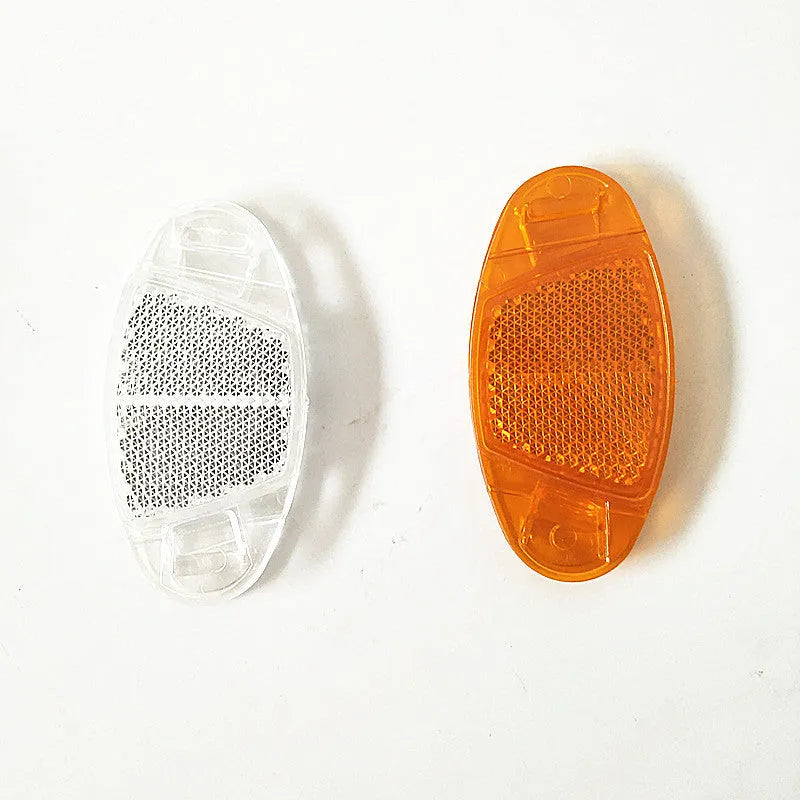 White and yellow bicycle spoke reflector safety decorations measuring 7.2cm by 3.5cm