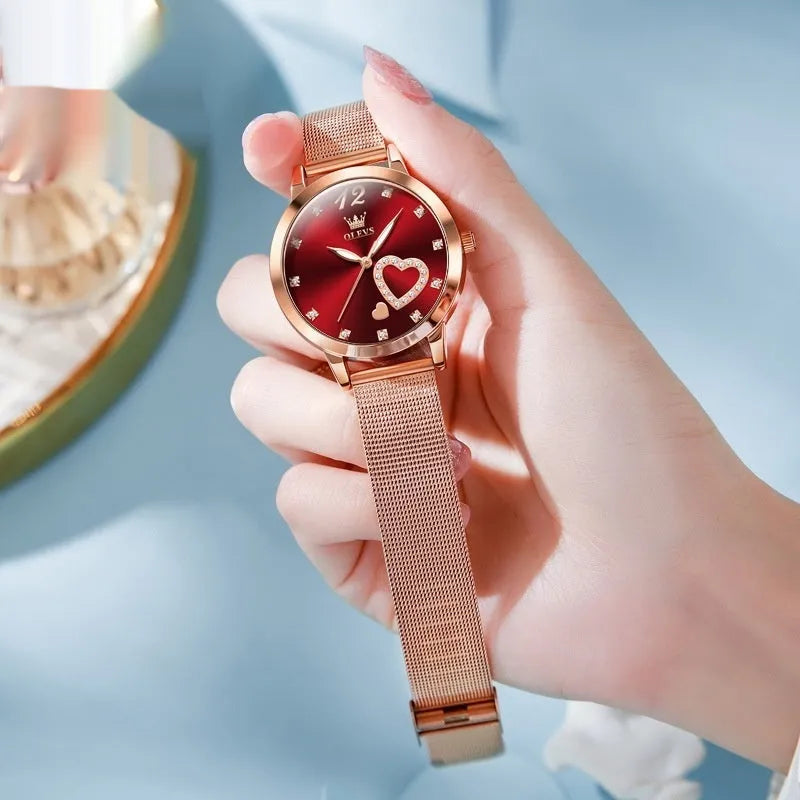 Women's rose alloy case watch with mesh strap shown in black, blue, green, pink, red, and white dial colour options.
