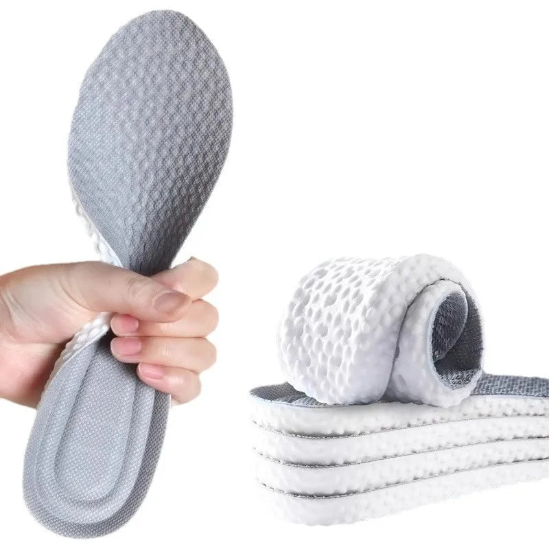 Breathable grey PU sports insoles with high elasticity shown alongside scissors demonstrating trim-to-fit feature