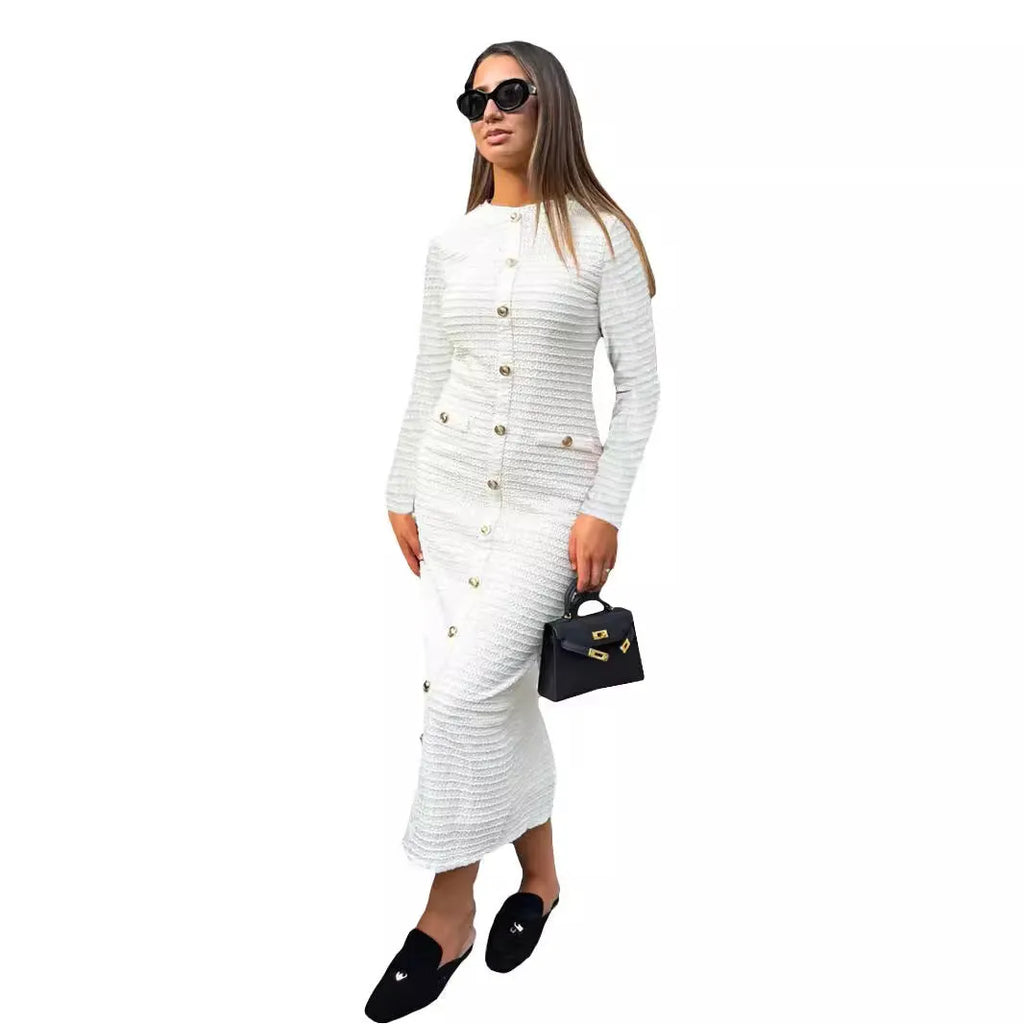 French retro slim fit knitted long-sleeved dress in black with button detailing and one-step skirt