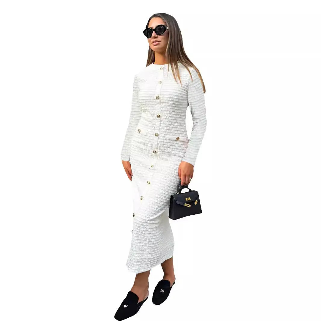 French retro slim fit knitted long-sleeved dress in black with button detailing and one-step skirt