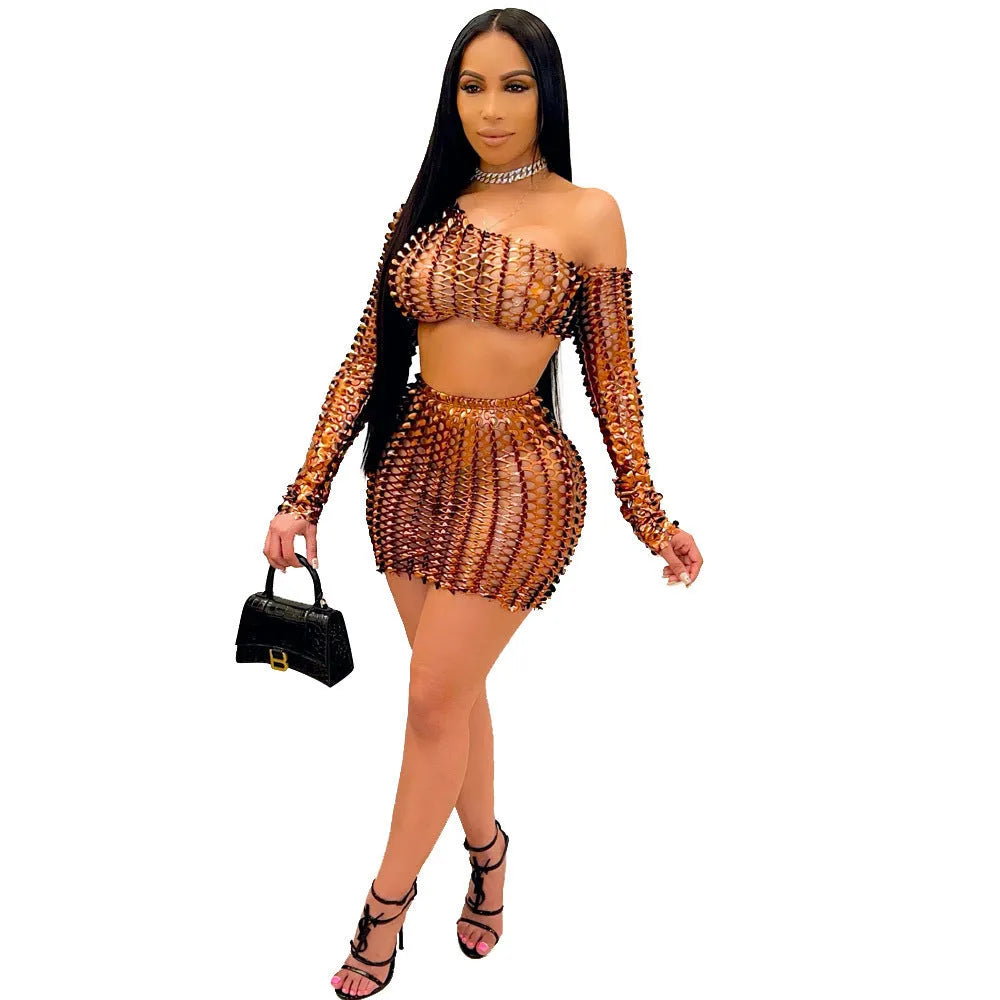 Women's black hollow-out net sleeveless top and short skirt two-piece dress set on a hanger
