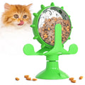 Blue interactive pet puzzle feeder toy with spinner and strong suction cup base.