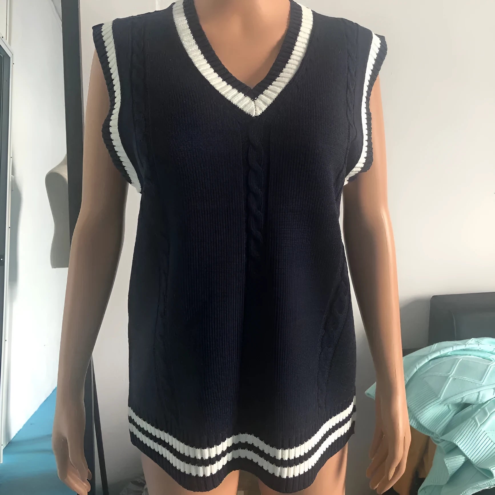 Women's v-neck waistcoat sweater with striped stitching in knitted acrylic fabric
