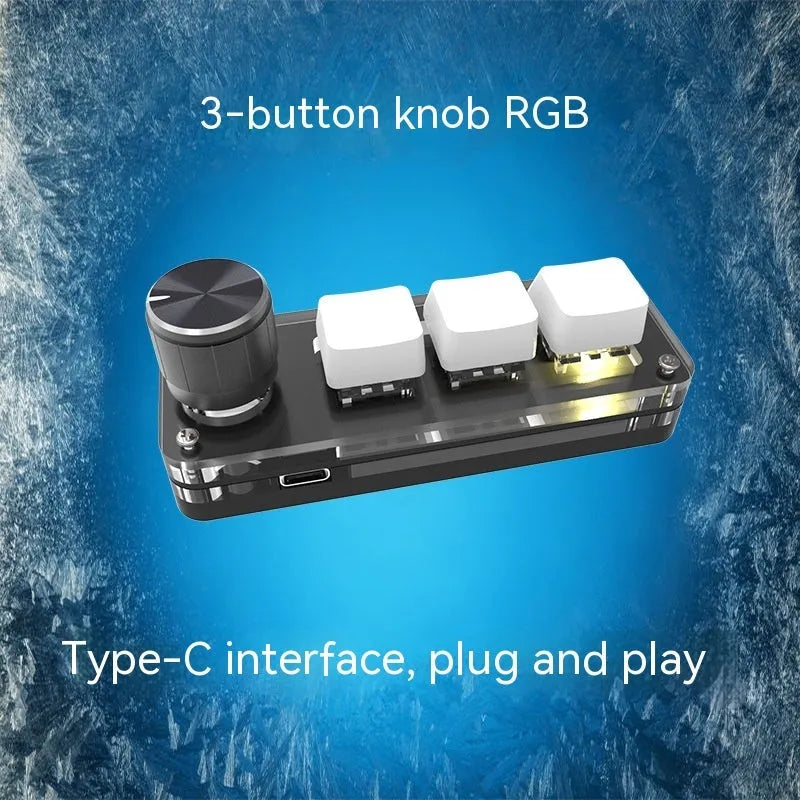 Black macro keypad with RGB backlit keys for copy paste commands beside USB cable